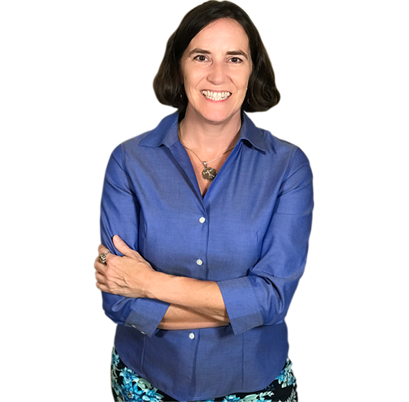 Woman in blue shirt smiling with arms crossed.